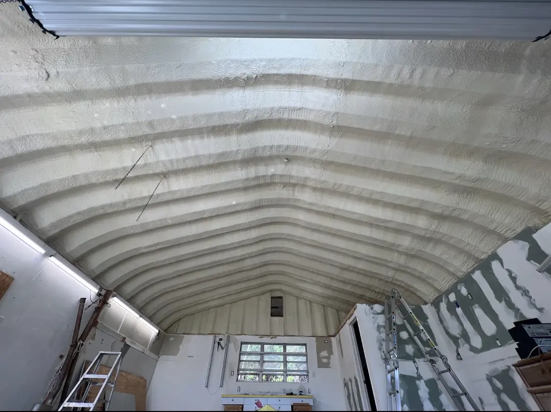 Spray polyurethane foam applied to the underside of a metal roof deck in Buffalo Grove